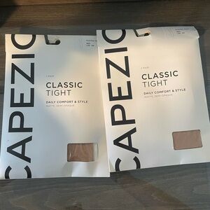 2 Capezio footed tights and 3 hair pieces